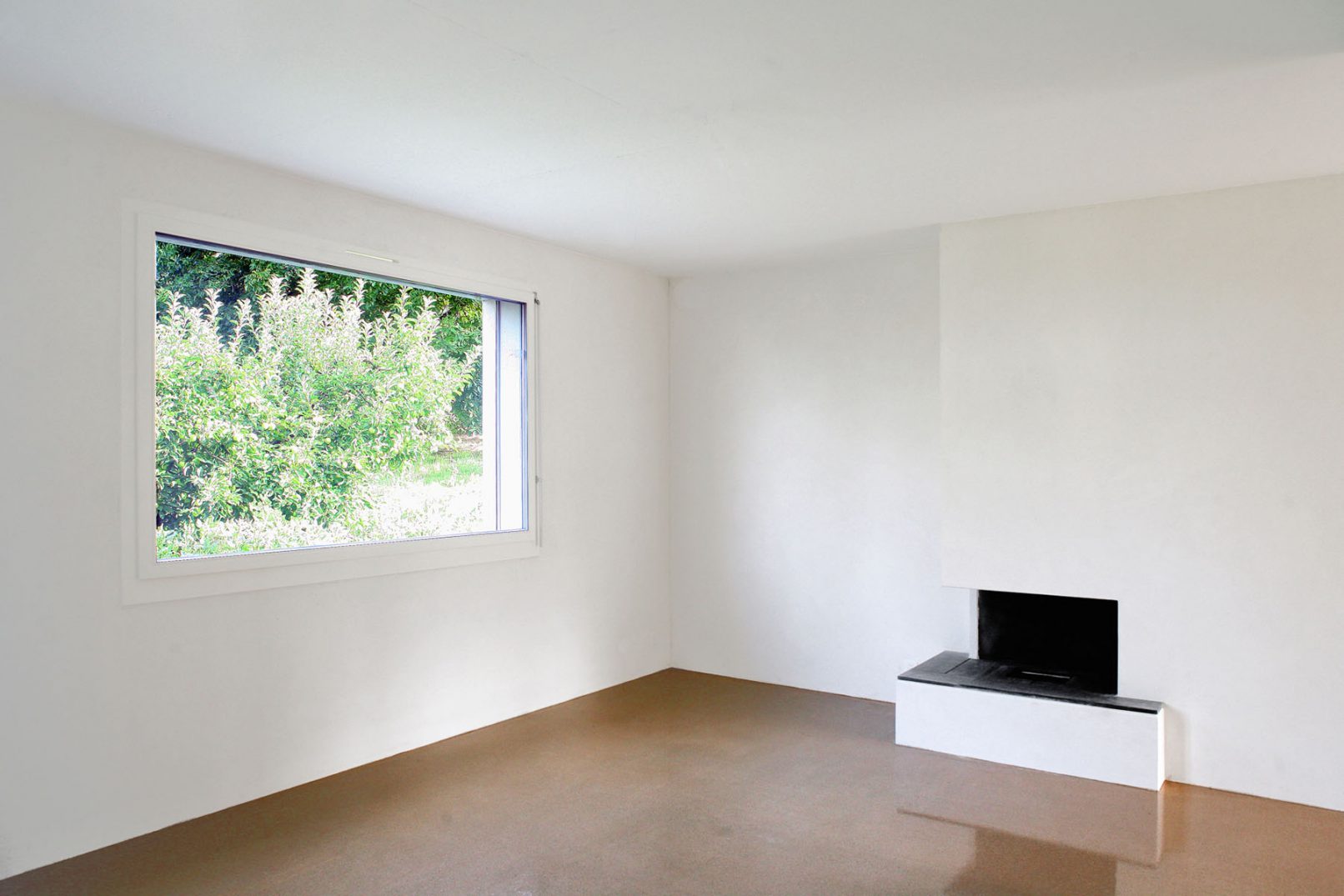 Intérieur blanc d'une villa à Laconnex dans la campagne Rhône Arve à Genève